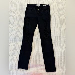 Frame ripped black jeans